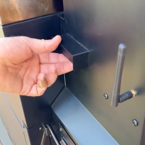 Dump wood pellets from hopper